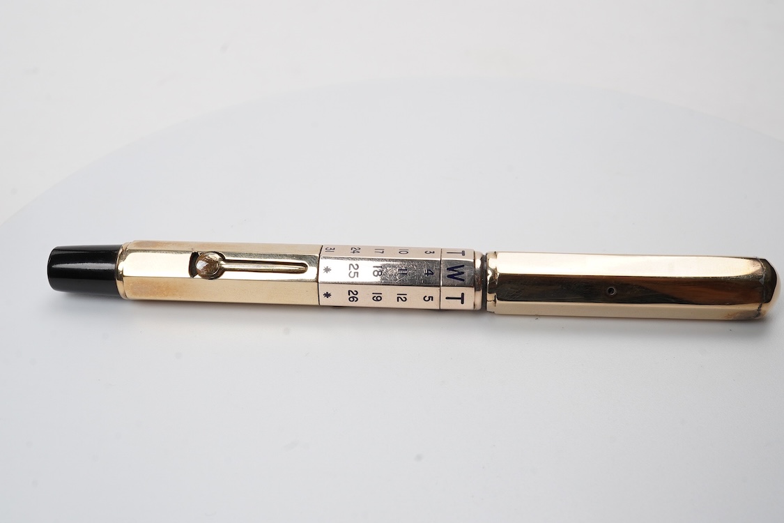 A very rare Waterman FDW 9ct. gold octagonal lever filled pen with perpetual calender fitted with No.2 Waterman nib